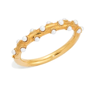 A cultured pearl bangle, of round section, oval, hinged form, the upper half with scattered...