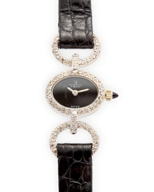 Montre Royale. A diamond set manual wind wristwatch with onyx dial and crown17 jewel manual wind movement signed MRG, onyx dial with gold hands, oval case with