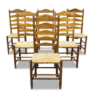 
	
		A set of six Gimson style ladder back chairs by Neville Neal
		c.1980, three chairs...