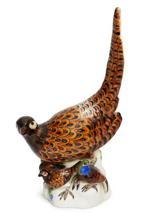 
	
		A Meissen porcelain figure group of a pheasant and chicks, c.1969, blue crossed swords...