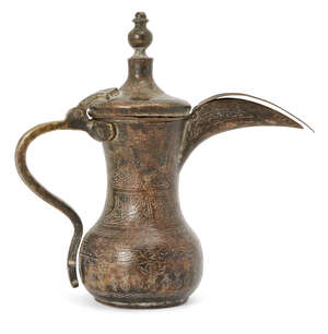 
	
		An engraved copper ewer with inscription, Syria or Turkey, 17th/18th century, 23cm....