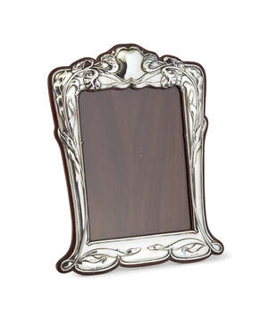 
	
		E. Mander & Son, an Art Nouveau silver and mahogany photograph frame
		Mark of E. Mander...