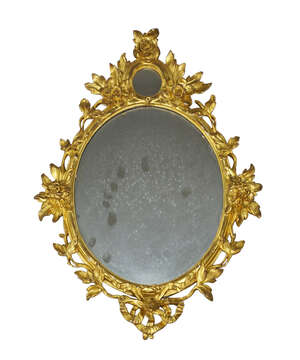 
	
		A George III carved giltwood oval wall mirror, with subsidiary plate to crest, floral...