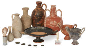 
	
		A black-figure stemmed kylix, the exterior decorated with palmettes alternating with...