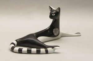 
	
		A Cmielow reclining cat, printed and inscribed marks to base, B 5068/158, 31 cm...