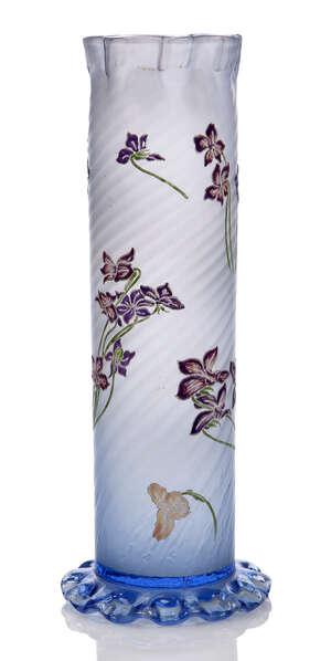 
	
		Emile Gallé (1846-1904), a tall pale blue and enamelled glass vase  
		c.1900, signed on...