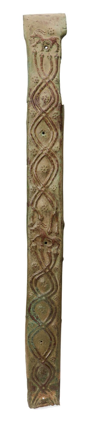 A Luristan bronze bracket, circa. 2000BC, of elongated form, designed with recurrent intertwined snake motif terminating with stylised horses, to a later fitte