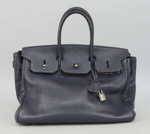 
	
		Hermes: an Hermes Birkin Retourne handbag, in navy blue Togo leather, blind stamp D for...
