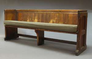 
	
		A stained pine Church pew, 20th Century, with loose cushion, 86cm high x 207cm wide x...