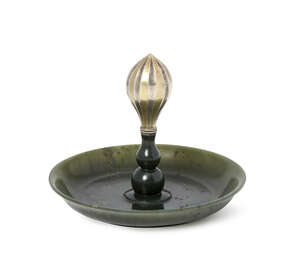 
	
		A Mughal jade tray with central silver knop, early 20th century, the round tray with...