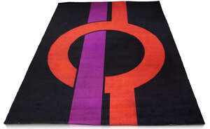 
	
		Pierre Cardin (b. 1922), a woollen carpet 
		c.1970 
		with geometric purple and red...