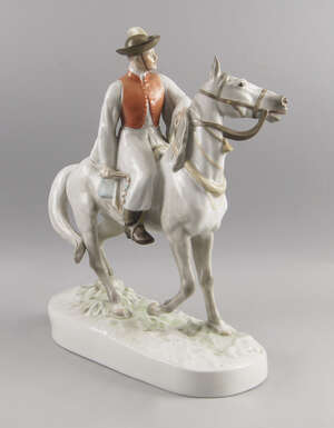 
	
		A Herend porcelain figure group of a horse and rider modelled by Bela Markup, stamped...