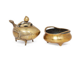 
	
		Two Chinese polished bronze censers, 19th century, one formed as a peach, 13cm long, the...