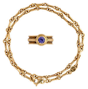 
	
		An 18-carat gold ring and neck chain, by Theo Fennell, the ring collet set with a...