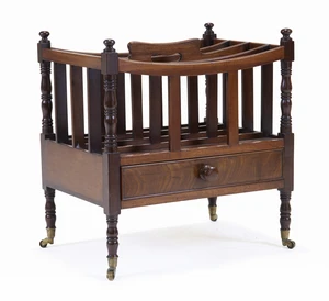 A Victorian mahogany Canterbury, last quarter 19th century, with four divisions, above a single...