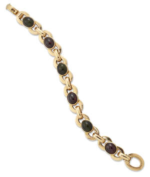 
	
		A gold bracelet, of circular linking accented with cabochon garnets and tourmalines,...