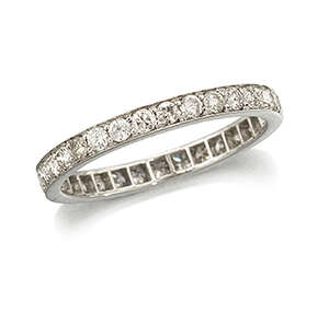 
	
		A diamond eternity ring, composed of a single row of circular-cut diamonds, ring size...