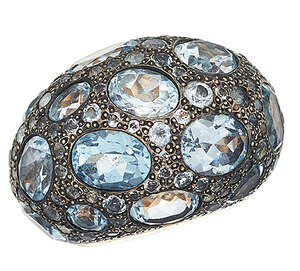 
	
		A blue topaz 'Tabou' ring, by Pomellato, of pave circular-cut topaz bombe design with...