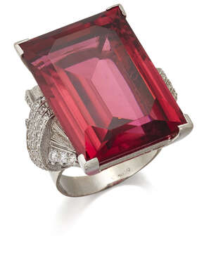 
	
		 A rubellite and diamond ring, centring on a rectangular-cut red tourmaline, rubillite,...