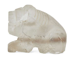 
	
		A carved rock crystal lion, Iran, drilled through front legs to behind, the mouth...