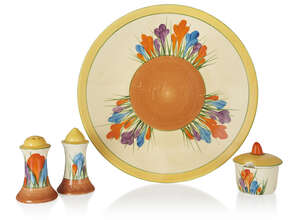 
	
		Clarice Cliff (1899-1972), 
		 
		Crocus pattern plate and cruet set, 1928-1936, 
		