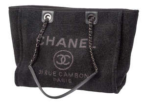 
	
		A Chanel shopping bag, the rectangular form body designed with mix-fibre and silver tone...