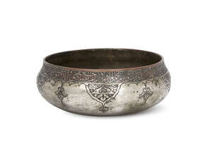 
	
		A Zand or Qajar tinned copper bowl, Iran, 18th-19th century, the rim inscribed with a...