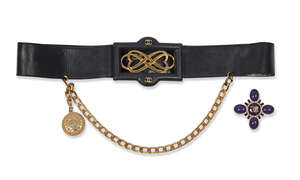 
	
		Chanel: a black leather and gilt metal chain belt, with oblong leather covered clasp with...
