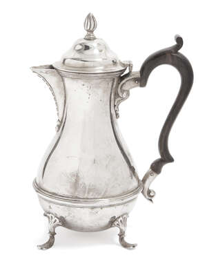 
	
		An Edwardian silver coffee pot, London, c.1901, William Hutton & Sons, the rounded body...