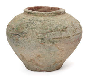
	
		A Chinese pottery green-glazed squat jar, Han dynasty, moulded with a band beneath the...