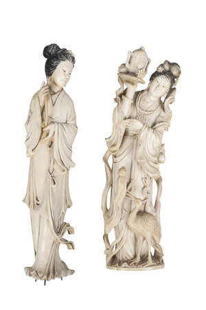
	
		A Japanese carved ivory figure of a lady, late 19th/ early  20th Century,  carrying a...