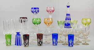 A pair of Regency glass bonbon vases and covers, overall decorated with cut decoration, 17cm high, together with three glass tazze, probably late 19th/early 20