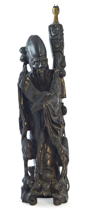 
	
		A large Chinese hardwood and wire inlaid lamp, early 20th century, carved as Shoulao...