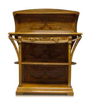 
	
		Louis Majorelle (1859-1926), an Art Nouveau small carved walnut buffet
		c.1900
		