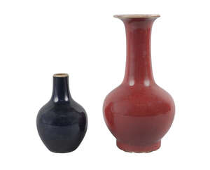 
	
		Two Chinese monochrome vases, 18th and 19th century, one with dark blue glaze, 12cm high...