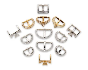 A group of signed watch bucklesIncluding: two gold and diamond set Vacheron Constantin buckles...