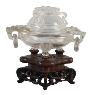 
	
		A Chinese rock crystal censer, 19th century, the cover carved with bat finial and three...