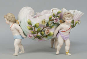 
	
		A Continental porcelain shell moulded centrepiece, possibly Sitzendorf,  late 19th/early...