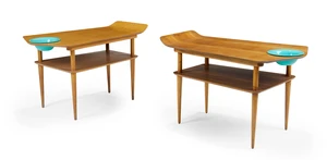 A near pair of 'Ski' side tables, third quarter 20th century, designed by Ewart Myer for Horatio Myer & Co., one in oak, one in walnut, 48cm high, 77cm wide, 4