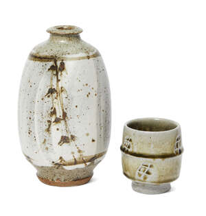 
	
		 Phil Rogers (1951-), a stoneware vase 
		c.2000, impressed seal to foot edge 
		An ash...