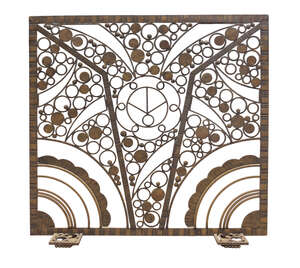 
	
		A French Art Deco wrought-iron radiator grill
		c.1925
		Openwork, circular and...
