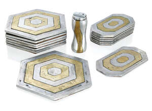 
	
		David Marshall (b.1942), 
		 
		Brutalist place mats and a table lighter, circa 1970,...