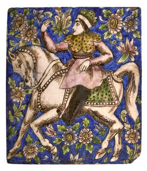 
	
		A Qajar moulded tile with woman on horseback, Isfahan, Iran, 19th century, underglaze...