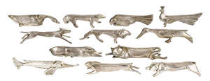 
	
		Christofle, a set of twelve Gallia metal knife rests
		c.1920, metal stamped maker's...