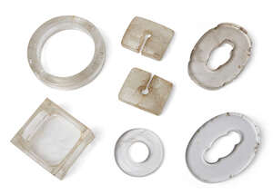 
	
		Seven pieces of rock crystal, 19th-20th century, comprising two tsubas, 8.5cm long, a...
