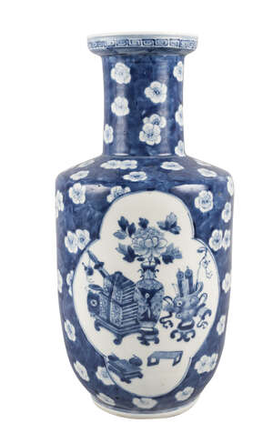 A large Chinese porcelain rouleau vase, Kangxi mark, 19th century, painted in underglaze blue with panels decorated with precious objects on prunus blossom gro