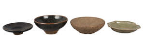 Four pieces of Chinese pottery, Yuan dynasty and later, comprising a Jian tenmoku tea bowl and dish, 10.5cm and 9cm diameter, a longquan celadon octagonal dish