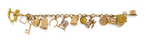 A charm bracelet, the fancy link chain suspending thirteen 9ct gold charms and a single heart shaped polished citrine, charms include: a chest; a windmill; a p