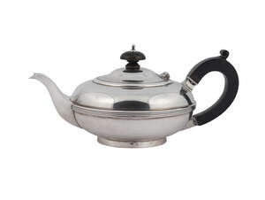 
	
		A silver teapot, London c.1916, E. Barnard & Sons, for Tiffany & Co.,  of circular squat...