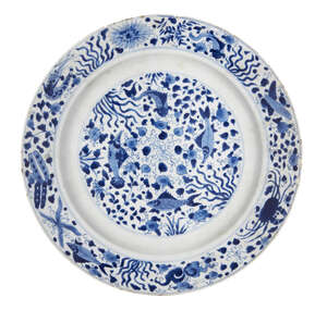 A Chinese porcelain 'fish' dish, Kangxi period, painted in underglaze blue with fish and a crab amongst pond weeds, apocryphal underglaze blue Chenghua